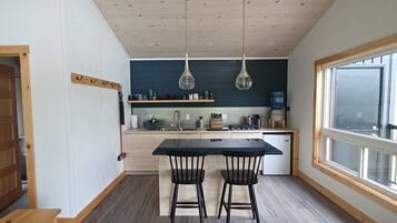 Cabin | Private kitchen | Mini-fridge, stovetop, cookware/dishes/utensils