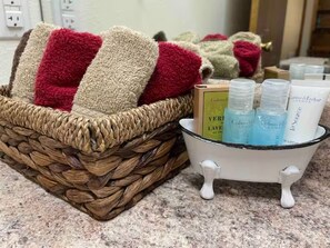 Hair dryer, towels, soap, shampoo