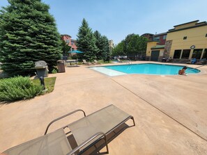 Outdoor pool, a heated pool - Spacious 2-bedroom condo in Broomfield with hot tub, pool, fitness room, WiFi (Broomfield)