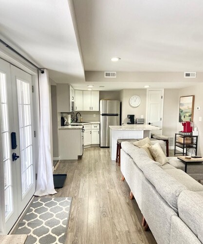 A clean luxury suite on a lakeside view with city amenities within 5 minutes. 