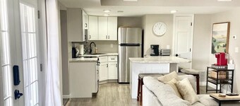 A clean luxury suite on a lakeside view with city amenities within 5 minutes. 