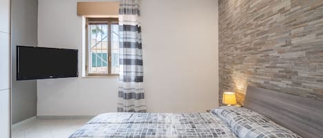 2 slaapkamers, een strijkplank/strijkijzer, gratis wifi, beddengoed