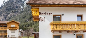Appartement 'Gartnerhof Glücksklee' avec vue sur les montagnes, jardin partagé et Wi-Fi