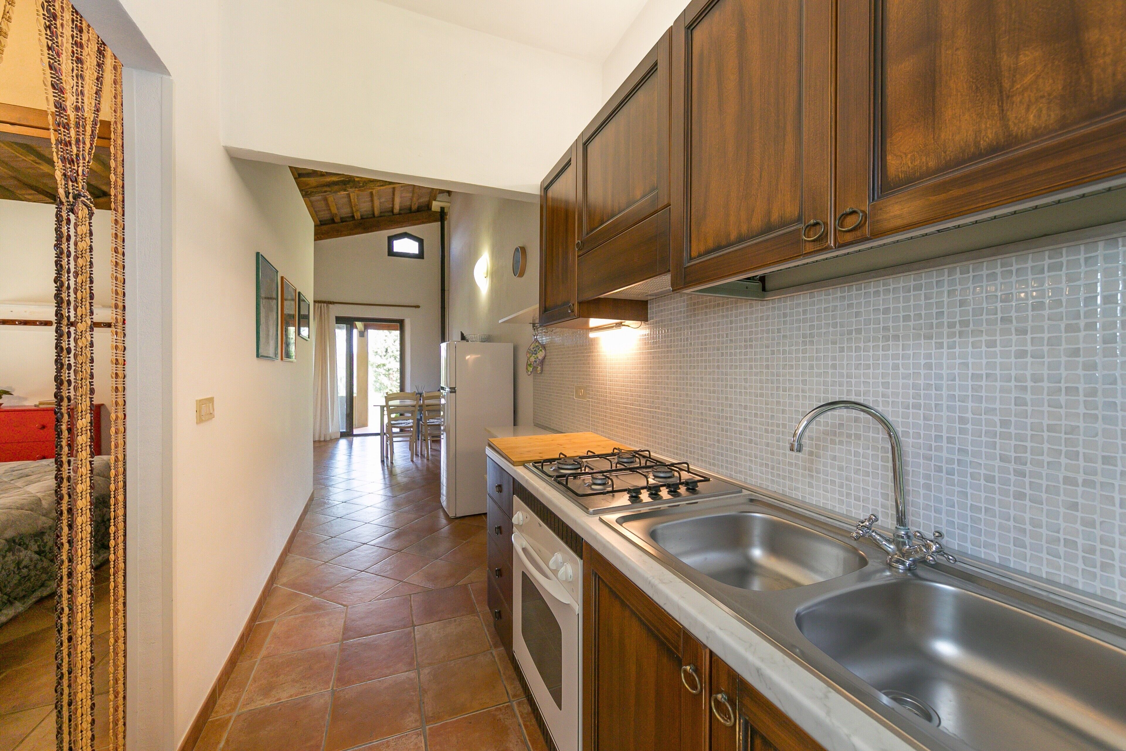 Frigorifero, forno, piano cottura, seggiolone