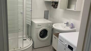 Hair dryer, towels, soap, shampoo