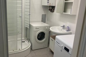 Hair dryer, towels, soap, shampoo