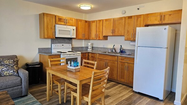 Coffee/tea maker, fridge, microwave, oven