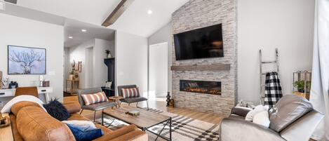 Smart TV, fireplace, video games, foosball