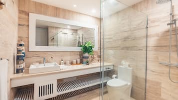 Shower, hair dryer, towels, soap