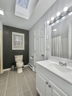 Hair dryer, towels, soap, shampoo