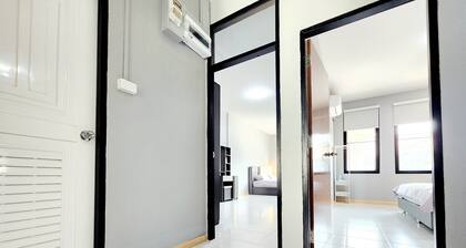 In the central of the city, close to convenience stores and transportation hubs.