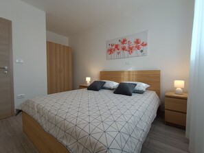 1 غرفة نوم ومكواة/لوح كي وواي فاي وملاءات أسرّة