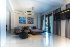 Harmony Villa with Sea View | Living area | 43-inch Smart TV with digital channels, fireplace - Helios Blue Villas (Kassandra)