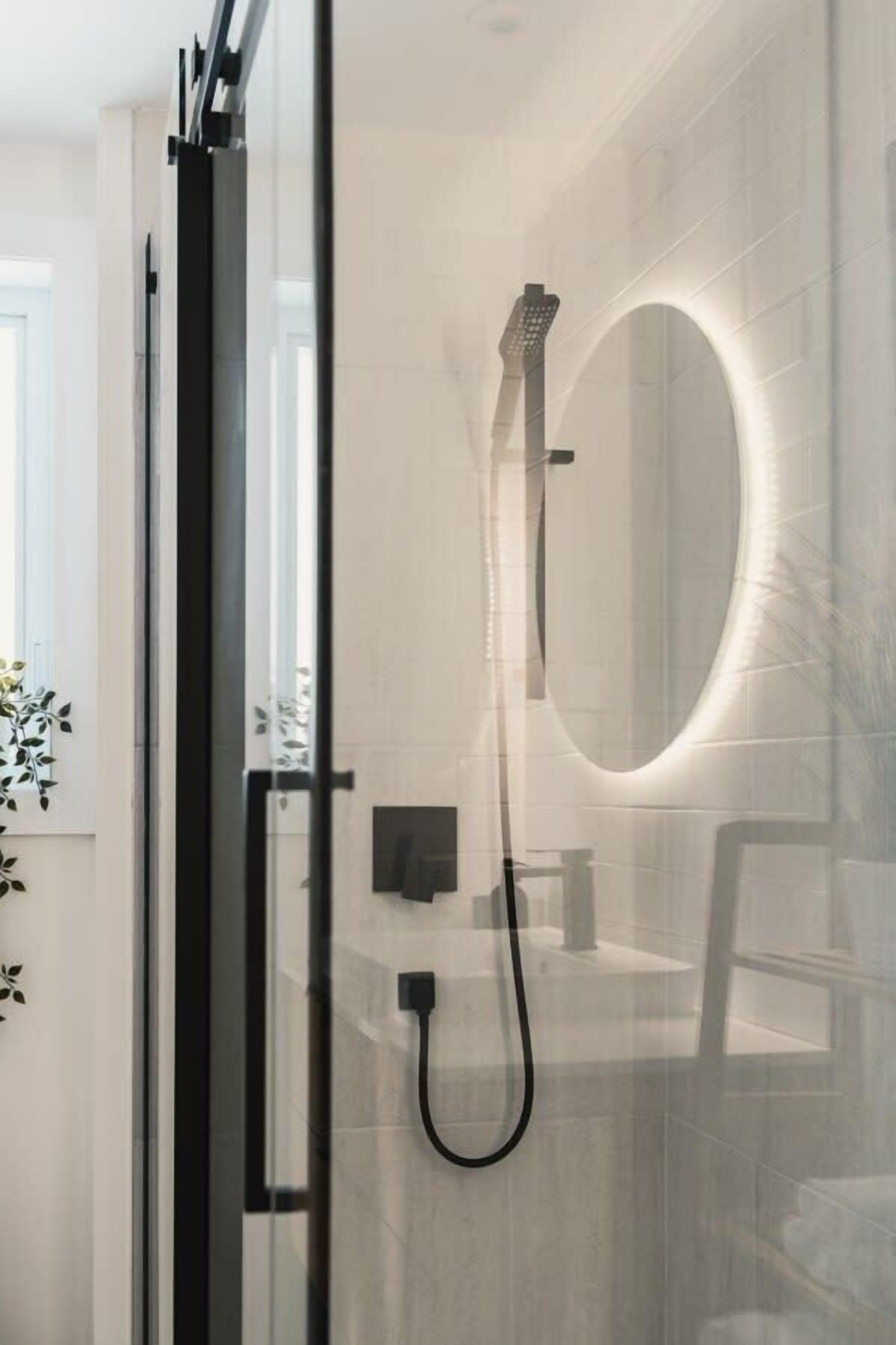 Shower, hair dryer, towels, shampoo