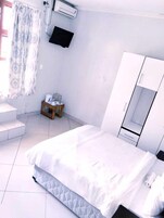 Quarto casal superior, vista para o jardim