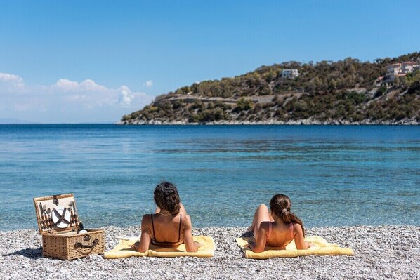 On the beach, beach towels