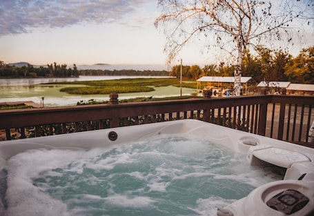 Luxury Cabin, Hot Tub, River View | Individually decorated, individually furnished, laptop workspace