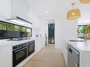 Coffee/tea maker, fridge, microwave, oven
