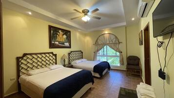 Deluxe Room | 1 bedroom, premium bedding, in-room safe, blackout drapes