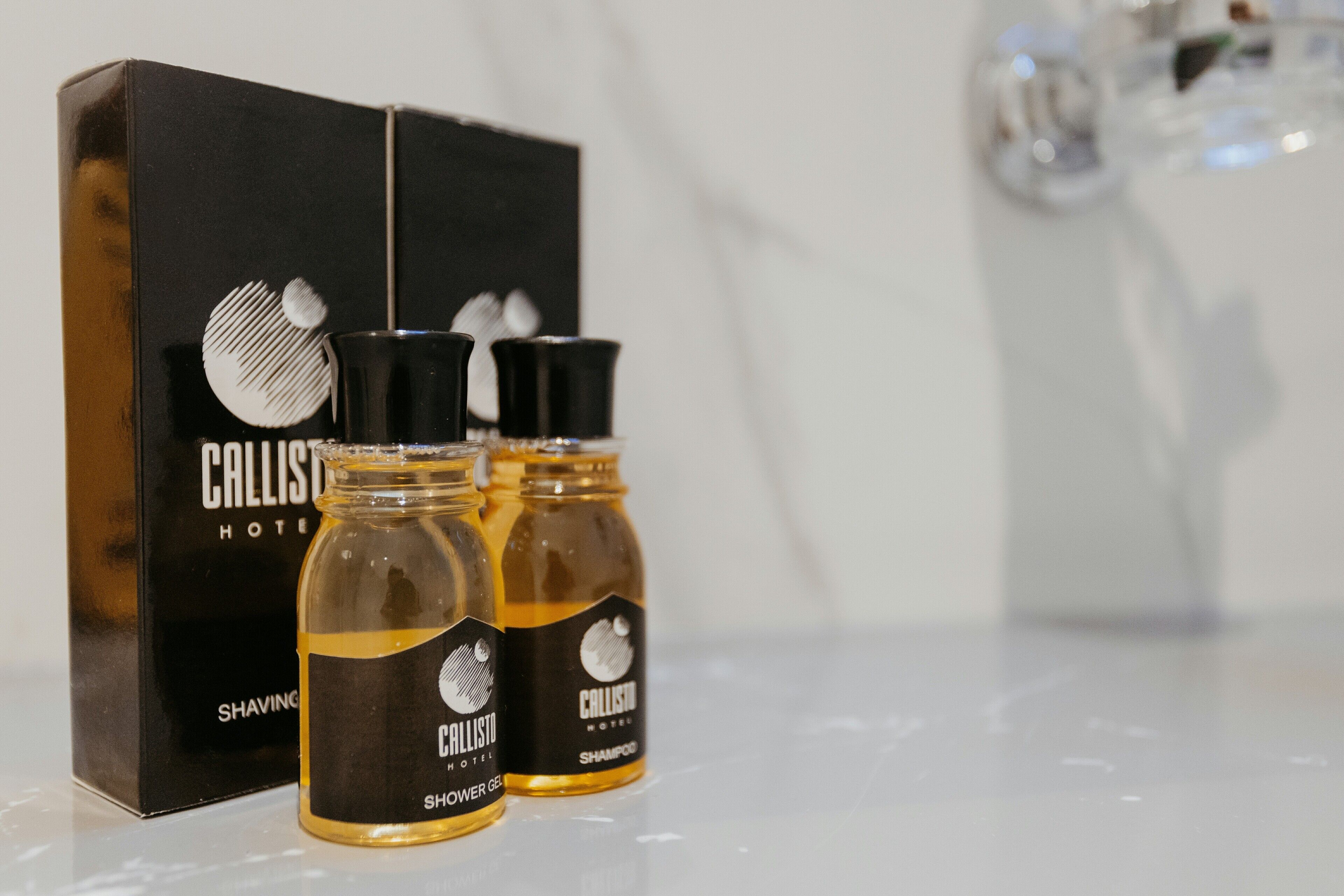 A Callisto Hotel box and two bottles of Callisto Shaving Gel.