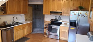 Coffee/tea maker, fridge, microwave, oven