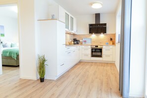 Réfrigérateur, four, plaque de cuisson, lave-vaisselle