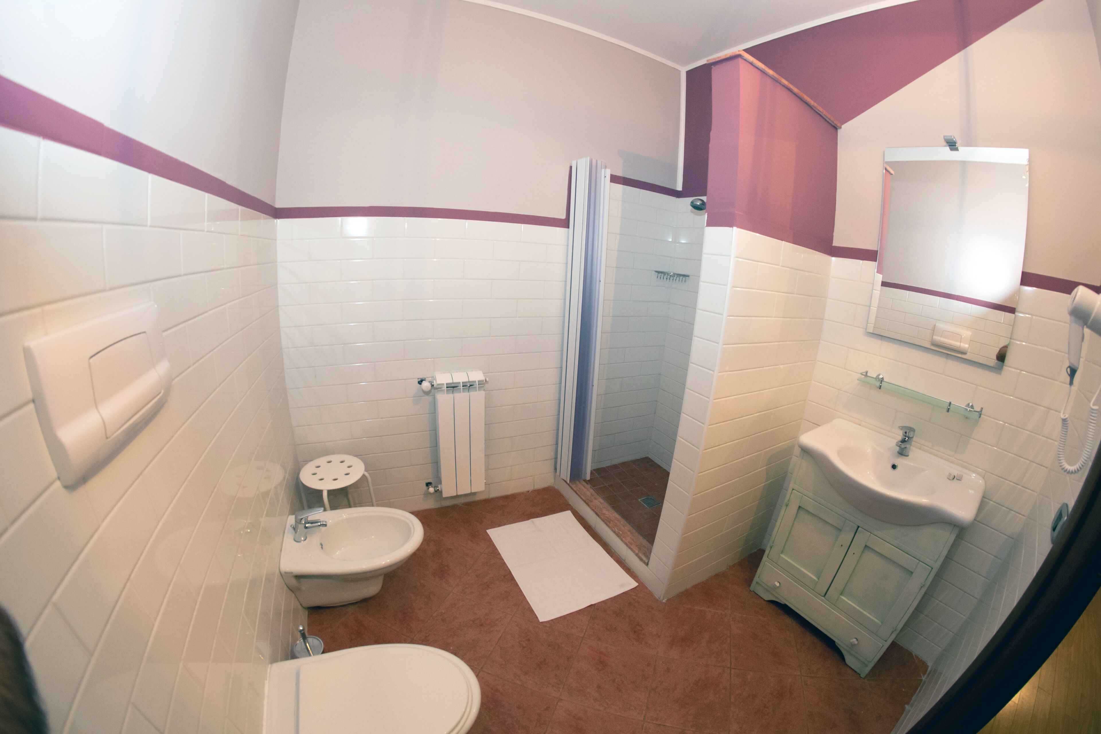 Triple Room, City View | Bathroom | Shower, rainfall showerhead, free toiletries, hair dryer
