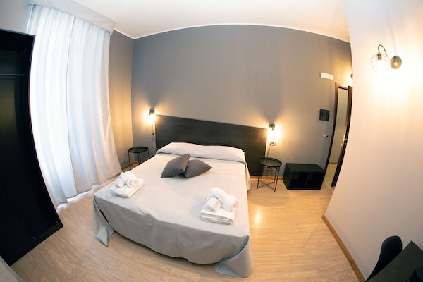 Double or Twin Room, City View | In-room safe, desk, WiFi (free), individually furnished