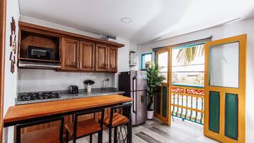 Comfort Apartment | Living area | 40-inch Smart TV with digital channels, Netflix, streaming services