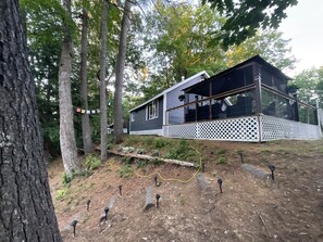 Property grounds - Cozy countryside cottage located on Crooked river in Naples Maine. (Naples)