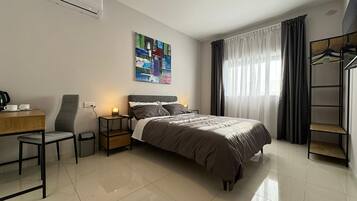 Individually furnished, desk, laptop workspace, blackout curtains