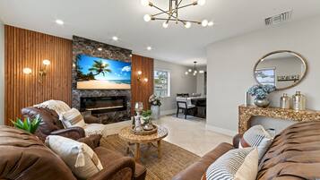 TV connectée, cheminée, jeux vidéo, baby-foot