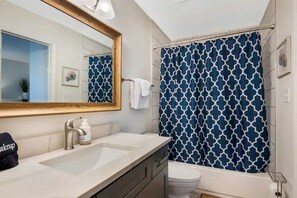 Hair dryer, towels, soap, shampoo