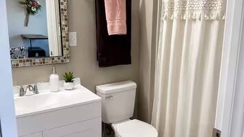 Shower, towels, soap, shampoo