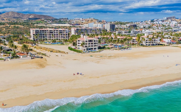 On the beach, sun loungers, beach towels