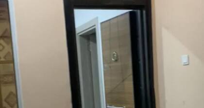 Cozy 3-bedroom bungalow with AC and WiFi in peaceful Jambanjelly