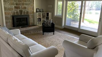 Smart TV, fireplace, books