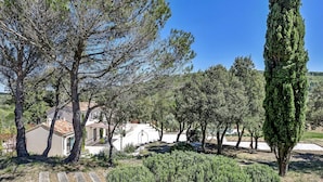 A house surrounded by trees and a clear sky. - Lovely home in Roussas (Roussas)