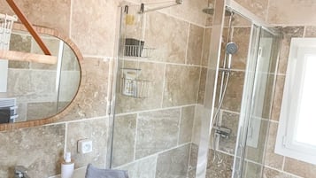 Hair dryer, towels, soap, shampoo