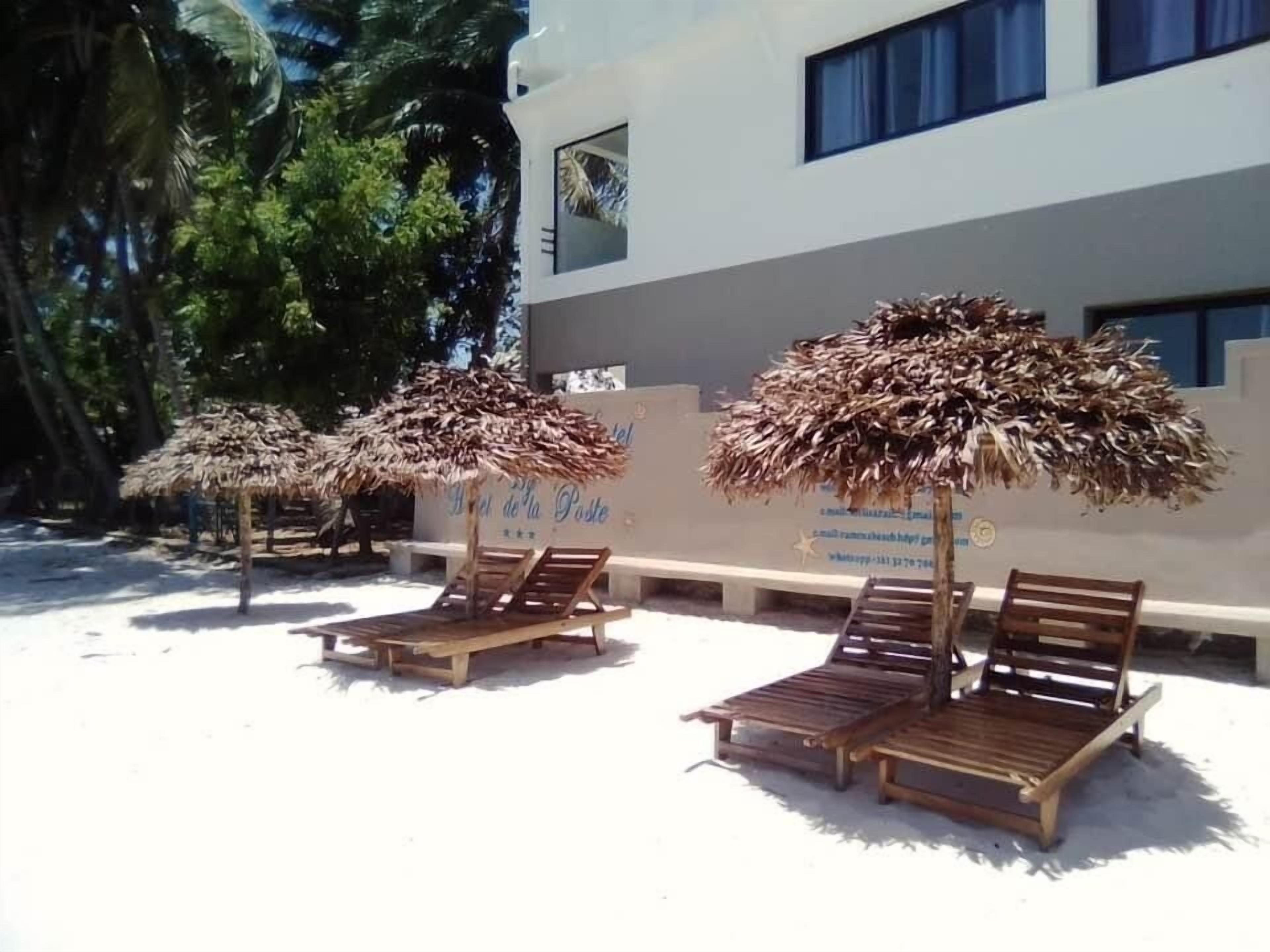 Chambre de luxe SUR LA PLAGE, 1 lit king | Terrasse/Patio