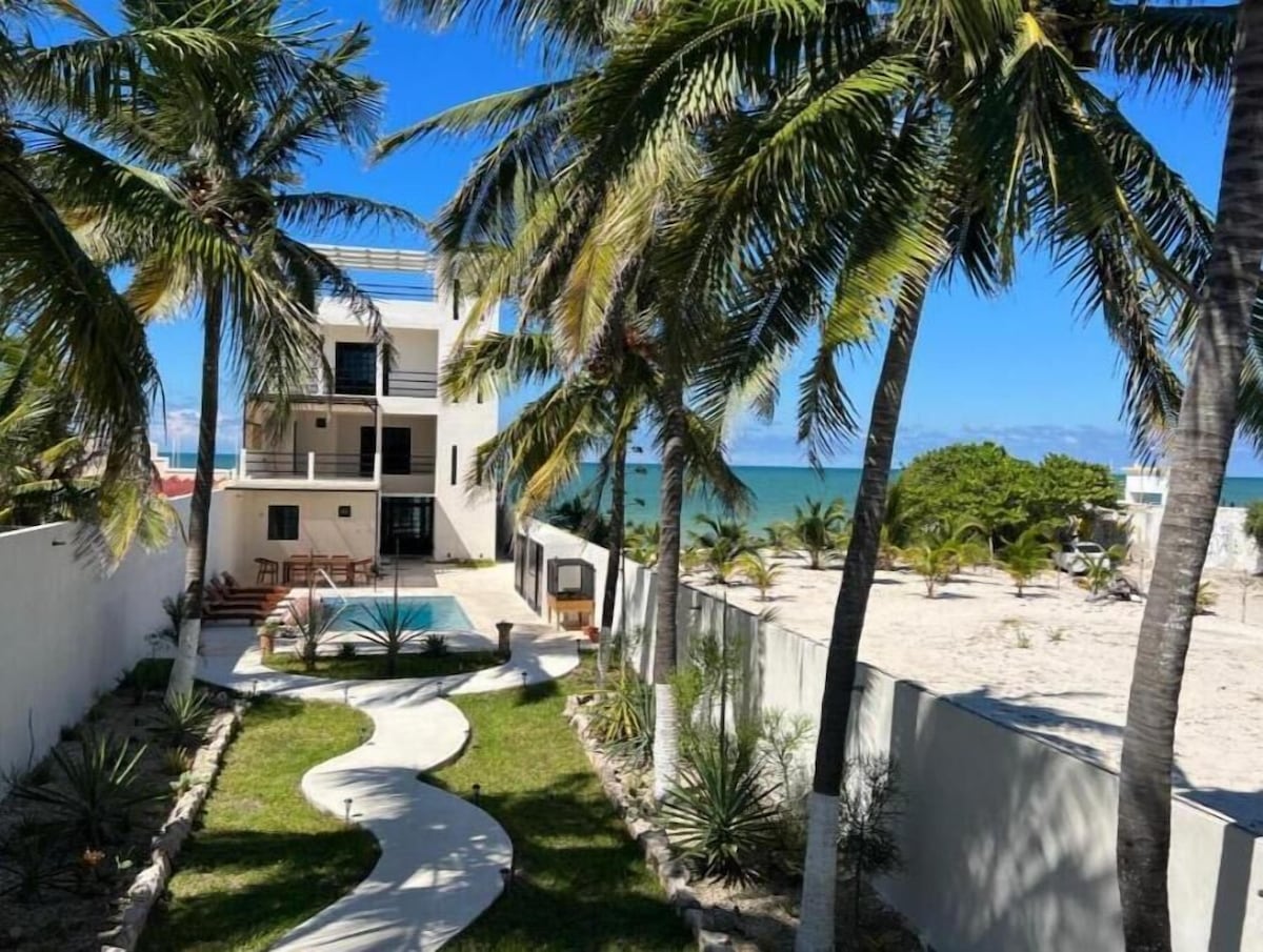 Oceanfront terrace and contemporary villa spaces at Mizu Villa
