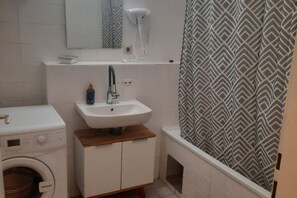 Hair dryer, towels, soap, shampoo