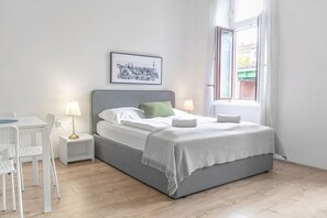 2 habitaciones, tabla de planchar con plancha, wifi y ropa de cama 