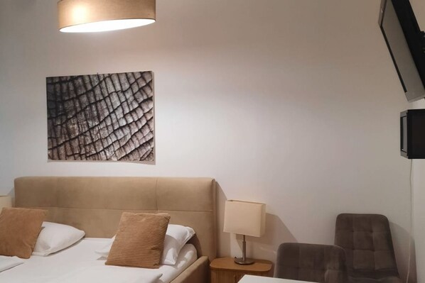1 chambre, fer et planche à repasser, Wi-Fi, literie fournie