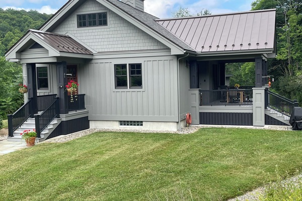 Large porch for dining, relaxing and watching the birds.