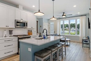 Fridge, microwave, oven, stovetop - Cozy Lake Cottage: Chefs Kitchen, BBQ & Lake Views (Belding)
