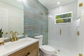 Shower, hair dryer, towels, soap