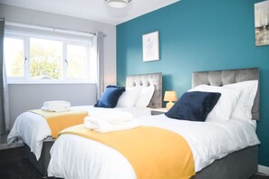 4 bedrooms, desk, iron/ironing board, travel crib