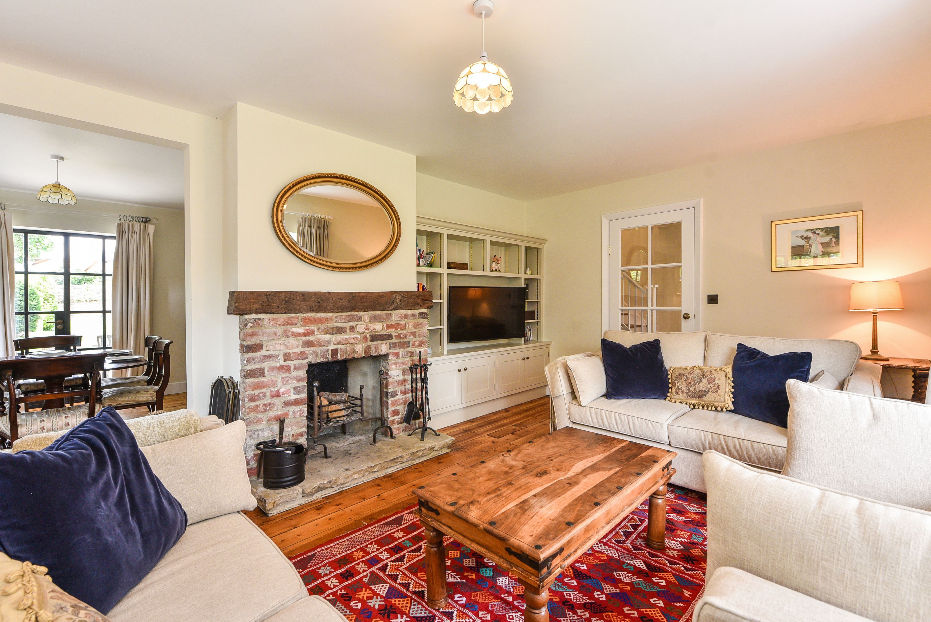 Smart TV, fireplace, books