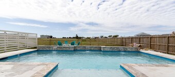 BRAND NEW 4/3.5 w/ heated pool and water views. Kid friendly and close to golf